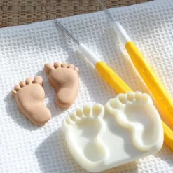 Découpoirs relief pieds (x2)